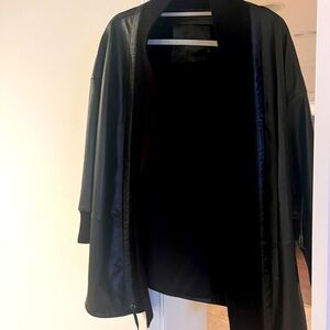 Gorgeous black leather, Ties on bottom. Bought while overseas custom. OS